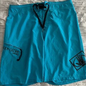 Body Glove Aqua Board Shorts with Black Accents. Size 34.